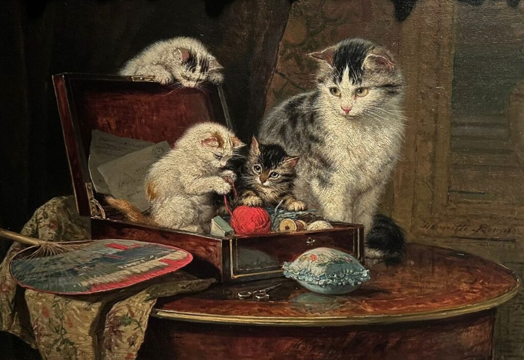 a painting with kittens at the Amsterdam cat museum