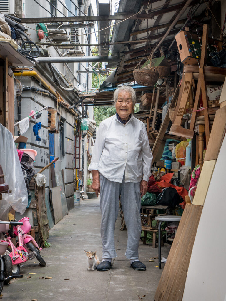a cat and its owner in China